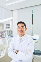 Professional dentist in dental clinic