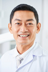 Asian mature doctor