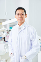 Professional dentist at office