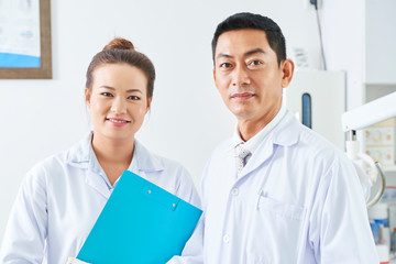 Medical colleagues standing at office