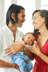 Happy parents with child
