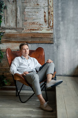 man sitting on a bench in park