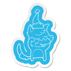friendly cartoon  sticker of a fox waking up wearing santa hat