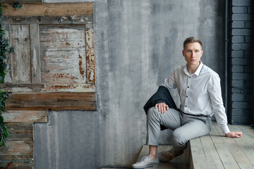 young man sitting on stairs