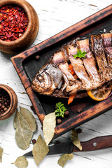 Carp stuffed with vegetables