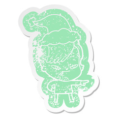 cute cartoon distressed sticker of a girl with hipster haircut wearing santa hat