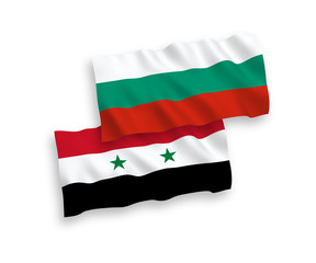 National vector fabric wave flags of Bulgaria and Syria isolated on white background. 1 to 2 proportion.