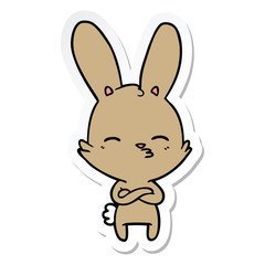 Obraz na płótnie Canvas sticker of a curious bunny cartoon