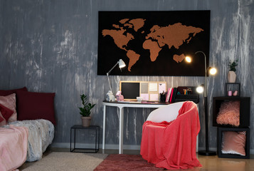 Interior of beautiful room with picture of world map