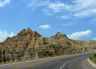 Paved winding roads make the Badlands National Park in South Dakota, USA more accessible to visitors.