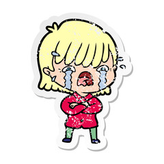 distressed sticker of a cartoon girl crying