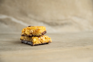 Muesli and cereal bar on marble stone background