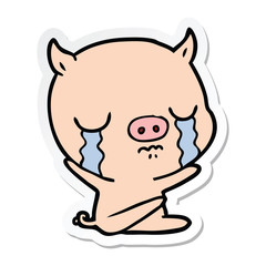 sticker of a cartoon sitting pig crying