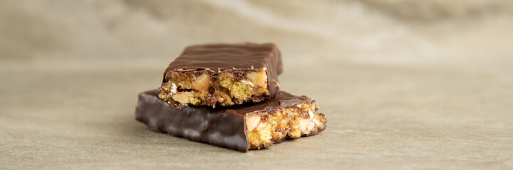 Muesli and cereal bar on marble stone background