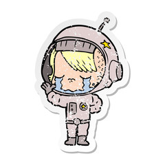distressed sticker of a cartoon crying astronaut girl