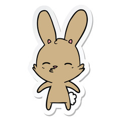sticker of a curious bunny cartoon