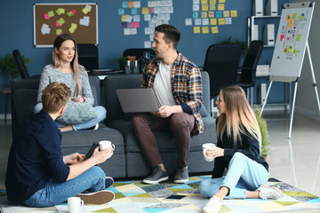 Young IT specialists working in modern office