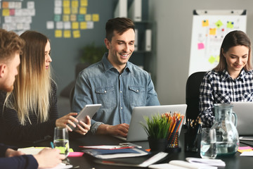 Young IT specialists working in modern office