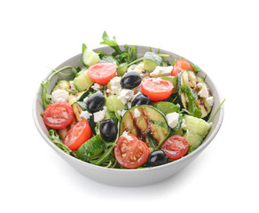 Bowl with healthy salad on white background