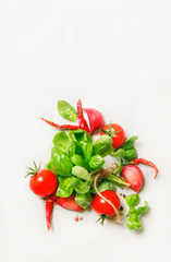 Fototapeta na wymiar Food cooking background, green basil and red cherry tomatoes with spices, top view