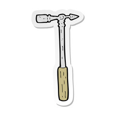 sticker of a cartoon pin hammer