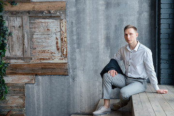 young man sitting on stairs