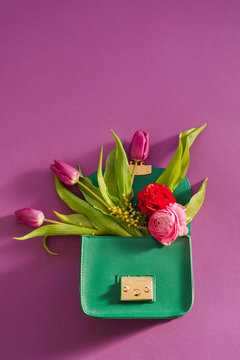 Flowers inside a woman's purse 
