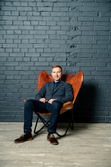 man sitting on chair