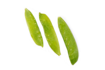 Fresh green peas isolated on white