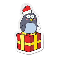 sticker of a cartoon christmas penguin