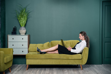 woman sitting on sofa