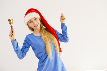 Christmas woman holding bell.