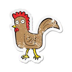 retro distressed sticker of a cartoon chicken