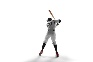 Baseball player isolated on white.