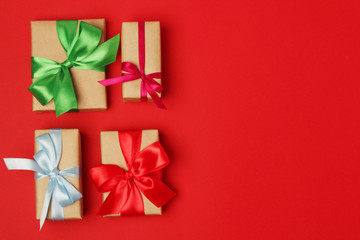 Gifts packed with craft paper and colorful satin ribbons