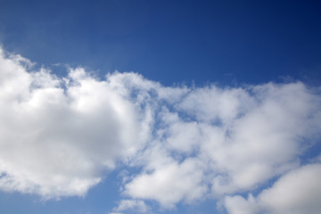 blue sky with cumulus clouds