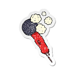 retro distressed sticker of a cartoon microphone