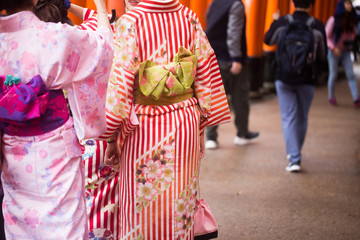 Naklejka premium Tourist women wear fashion of gimono traditional japanese costume