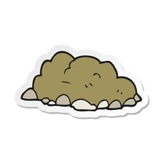 sticker of a cartoon pile of dirt
