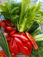 a plate of vegetables and herbs