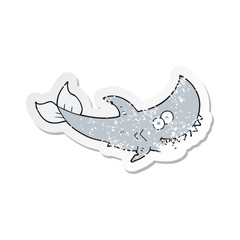 retro distressed sticker of a cartoon shark