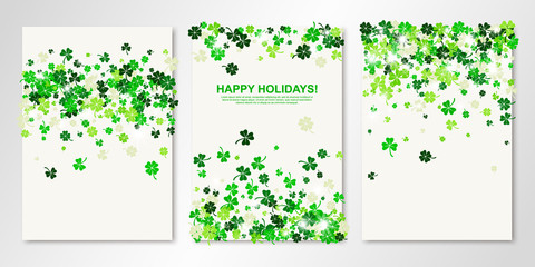 Saint Patrick's Day banners set of three sheets with four leaves greenery clover, shamrock confetti on white. Vector flyer design templates greeting cards, invitations. All layered and isolated