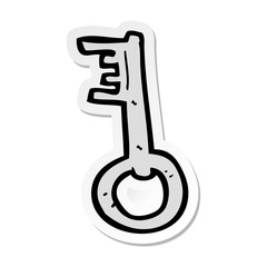 sticker of a cartoon old key