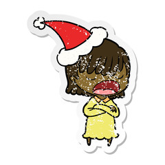 distressed sticker cartoon of a woman talking loudly wearing santa hat