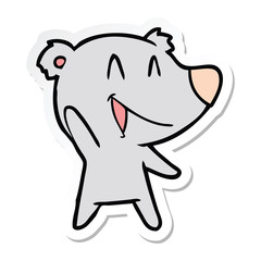 sticker of a laughing bear cartoon