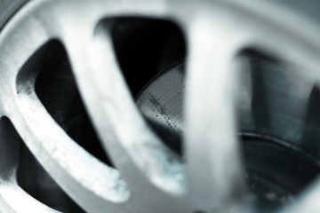 Brake disk of the car. Brake disc on white rim
