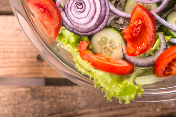 Fresh sliced salad of different vegetables close - up