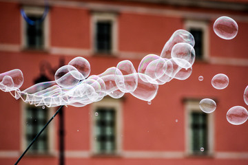 Soap bubbles on the background of architecture.