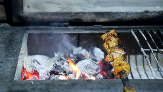 Freshly baked barbecue, and pieces of meat baked on the grill