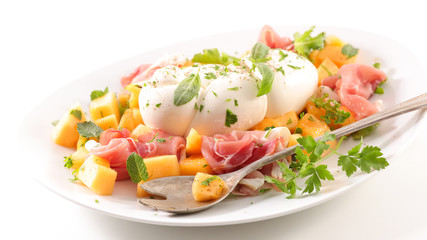 melon slices with prosciutto ham and mozzarella